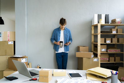 Young woman using mobile phone