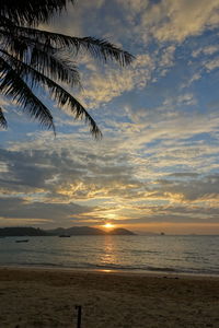 Scenic view of sea against sky at sunset