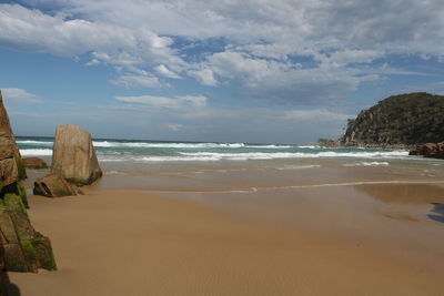 Scenic view of beach against sky