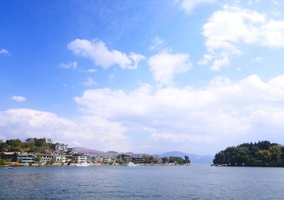 Scenic view of sea against blue sky