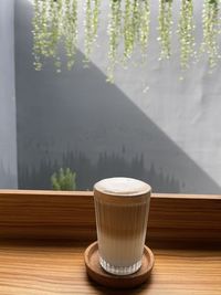 Close-up of coffee cup on table