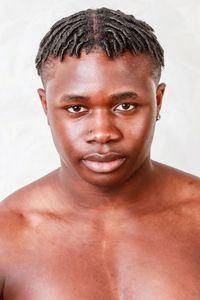 Close-up portrait of shirtless man