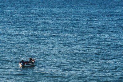 People swimming in sea