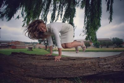 Full length of woman against sky