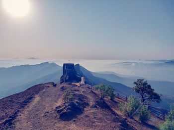 Scenic view of mountain against sky during sunset