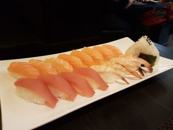 Close-up of sushi served on table