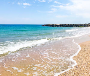 Scenic view of beach against sky