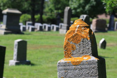 Close-up of stone structure in cemetery