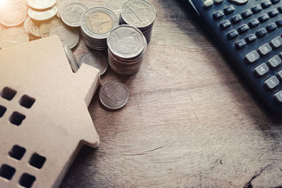 High angle view of coins on table