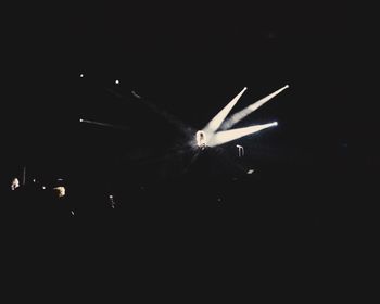 Low angle view of airplane flying in sky