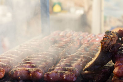 Close-up of meat on barbecue