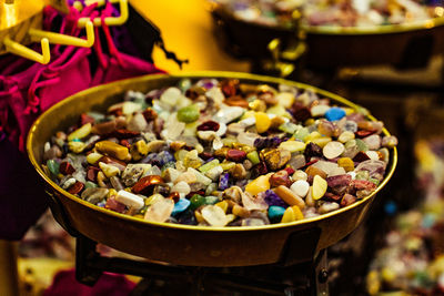 Close-up of candies in bowl on table
