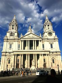 Low angle view of cathedral against cloudy sky