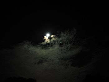 Low angle view of illuminated light in the dark