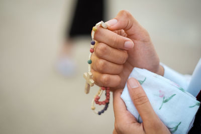 Close-up of hand holding hands