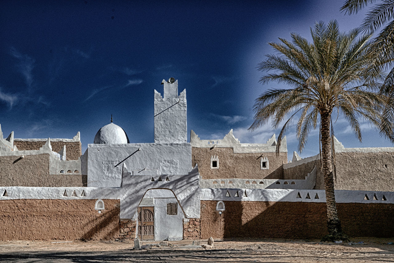 BUILDINGS AGAINST SKY