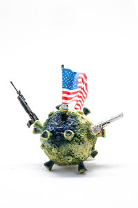 Close-up of toy flag against white background