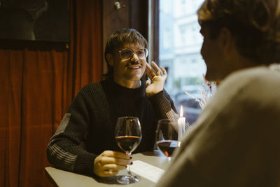 Young woman drinking alcohol