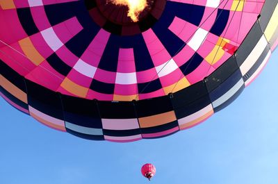 Low angle view of multi colored hot air balloon