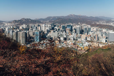 Cityscape against clear sky