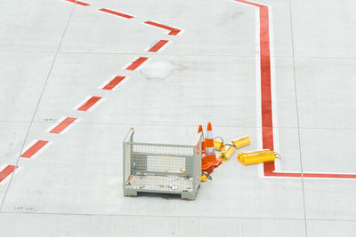 High angle view of arrow sign on road in city