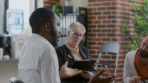 Business people having discussion at office