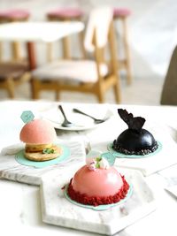 Close-up of cake served on table