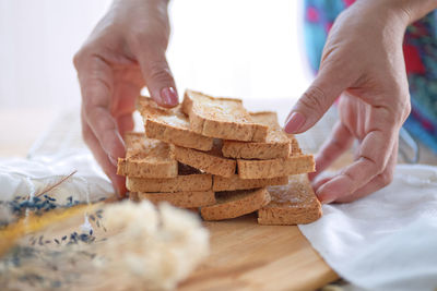 Midsection of man preparing food on table