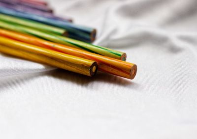 Close-up of colored pencils on table