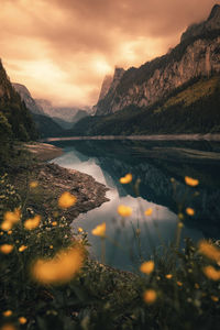 Scenic view of lake against sky during sunset