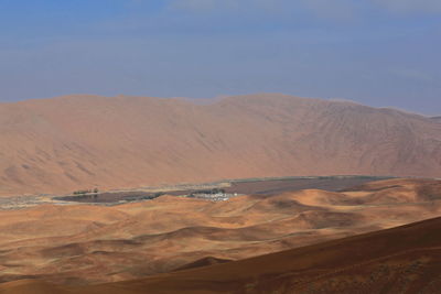 Scenic view of desert against sky