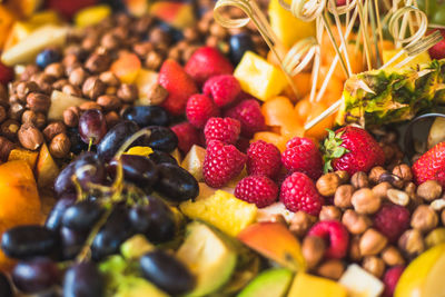 Close-up of fruits arranged in plate