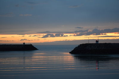 Scenic view of sea against sky during sunset