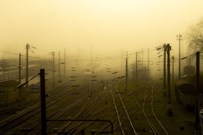 Railway tracks in foggy day