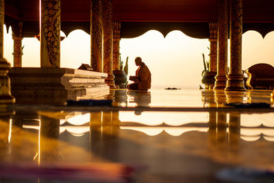 People sitting in temple