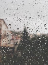 Full frame shot of raindrops on window