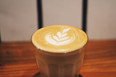 Close-up of cappuccino on table