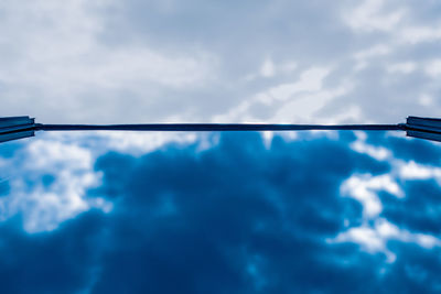 Low angle view of swimming pool against sky