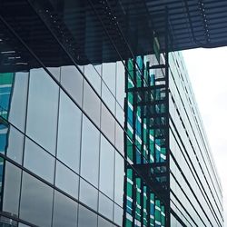 Low angle view of modern building against sky