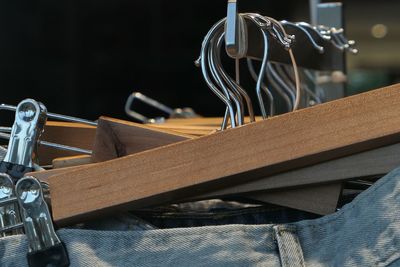 Close-up of clothes hanging on rack