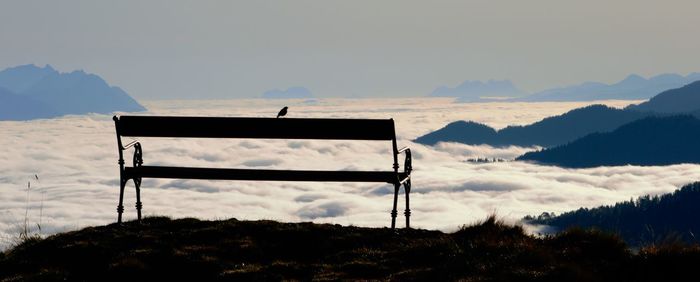 Scenic view of silhouette mountains against sky