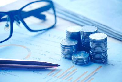 High angle view of coins on table