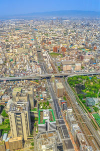 High angle view of street amidst buildings in city