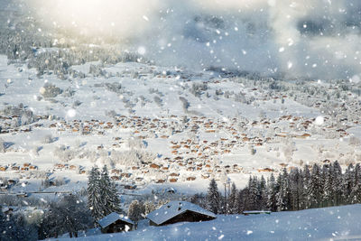 Scenic view of snowcapped mountains against sky during winter