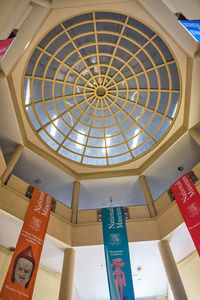 Low angle view of skylight in building