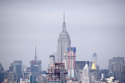 Low angle view of modern buildings against sky