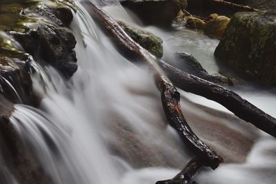 Close-up of water flowing through rocks