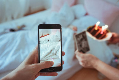 Close-up of woman using mobile phone