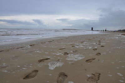 Scenic view of beach against sky