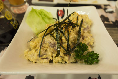 Close-up of served food in plate